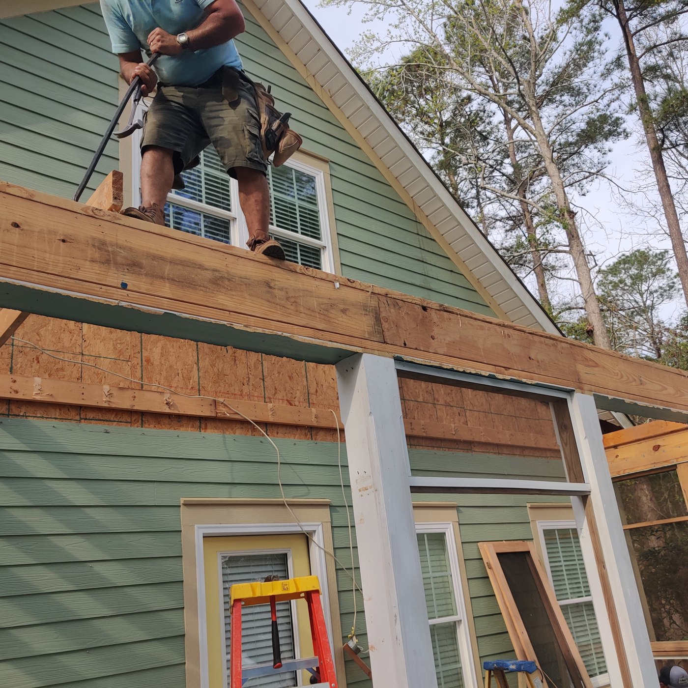 Home addition project — exterior and construction view 1