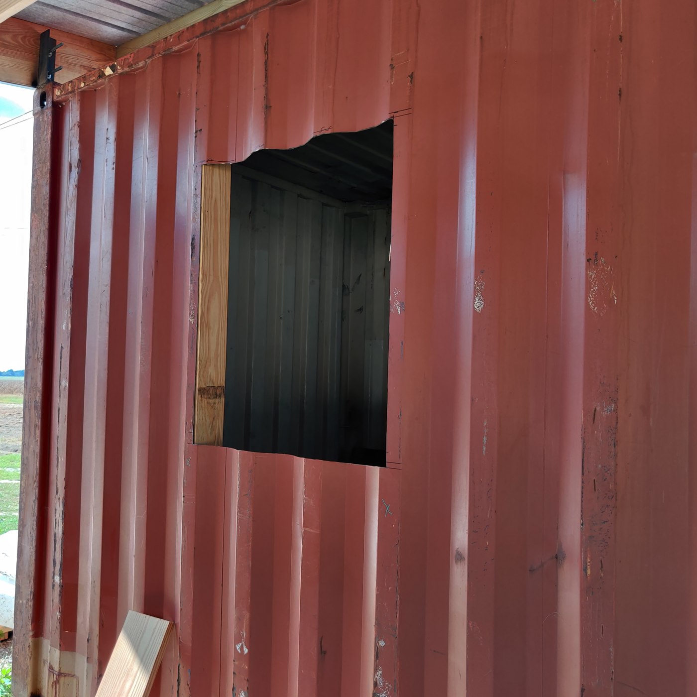 Storage container window and exterior construction