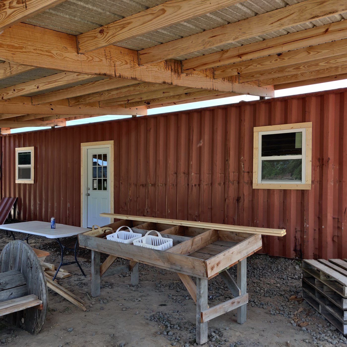 Storage container window and exterior construction
