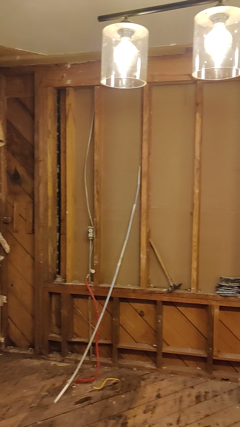 Exposed framing during kitchen demolition